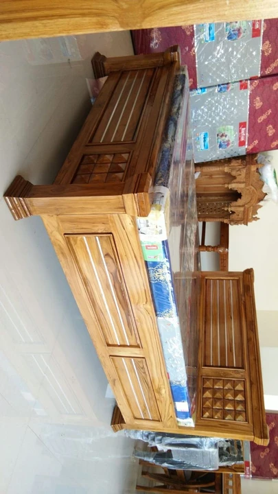 Teak wood bed uploaded by business on 11/3/2023