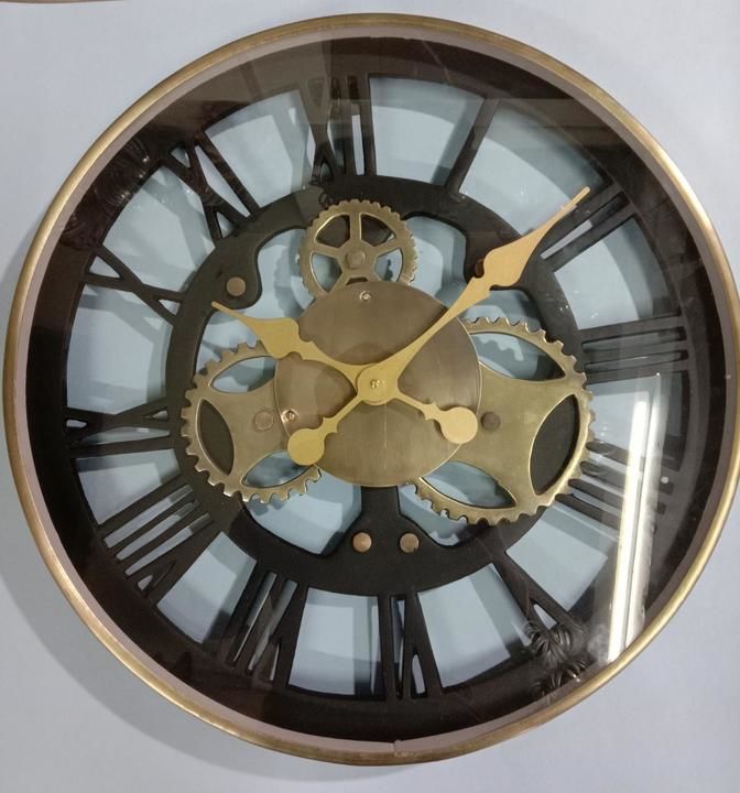 Metal wall clock uploaded by business on 3/23/2021