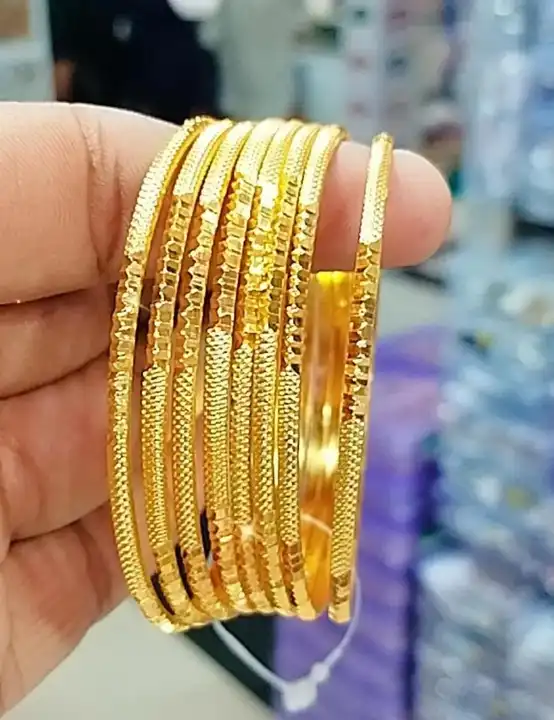 Gokd plated bangles  uploaded by Neekibha Collections  on 11/22/2023