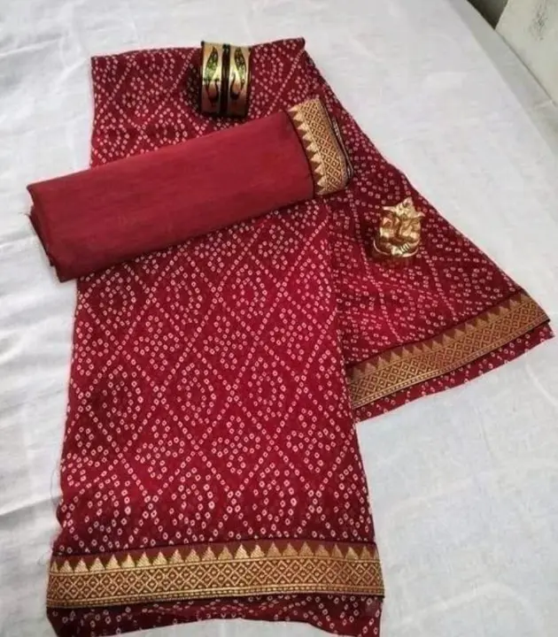 NEW BANDHNI PRITED CRYSTAL DESIGN WITH ZARI WOVEN BORDER .IT HAS 5.20 MTR IN LENGTH AND BLOUSE IN 0. uploaded by Metro Textiles on 11/22/2023