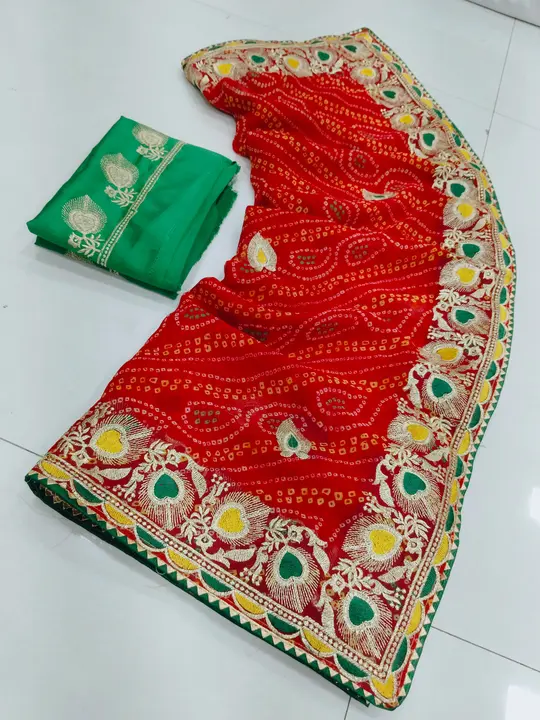 *Special Red Bandani*  Two designs 1. Morpank 2. Elephant  Fabric: Georgette  Blouse: BANGLORI SARTI uploaded by Marwadi Businessmen on 12/12/2023