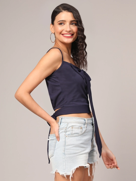 Blue Crop Top with Bow Accent Sleeve Less Women Top uploaded by VAIDEHI SUPER STORE VAIDEHI SUPER STORE on 12/13/2023