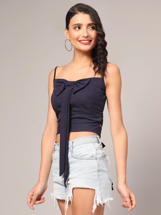 Blue Crop Top with Bow Accent Sleeve Less Women Top uploaded by VAIDEHI SUPER STORE VAIDEHI SUPER STORE on 12/13/2023