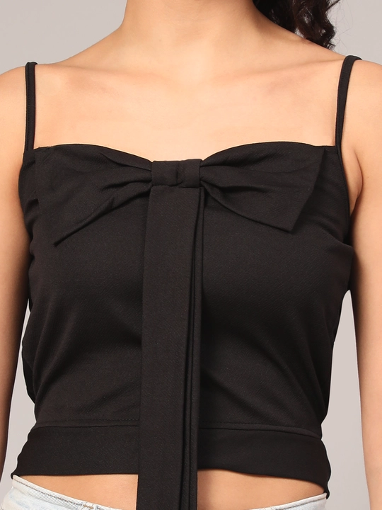 Black Crop Top with Bow Accent Sleeve Less Women Top uploaded by VAIDEHI SUPER STORE VAIDEHI SUPER STORE on 12/13/2023