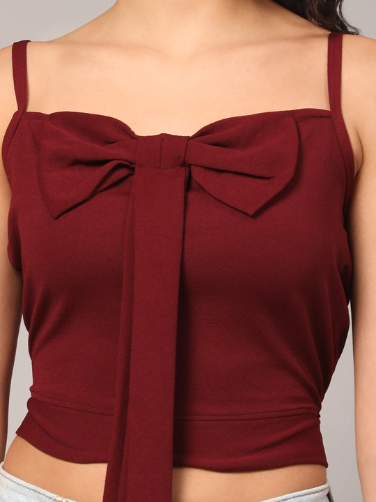 Maroon Crop Top with Bow Accent Sleeve Less Women Top uploaded by VAIDEHI SUPER STORE VAIDEHI SUPER STORE on 12/13/2023