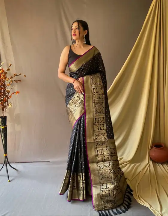 Black color banarasi silk saree with zari weaving work uploaded by VAIDEHI SUPER STORE VAIDEHI SUPER STORE on 12/15/2023