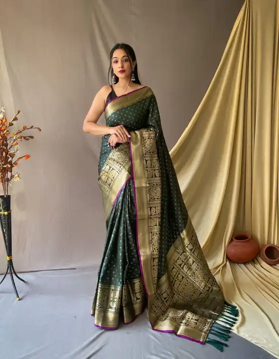 Green color banarasi silk saree with zari weaving work uploaded by business on 12/15/2023