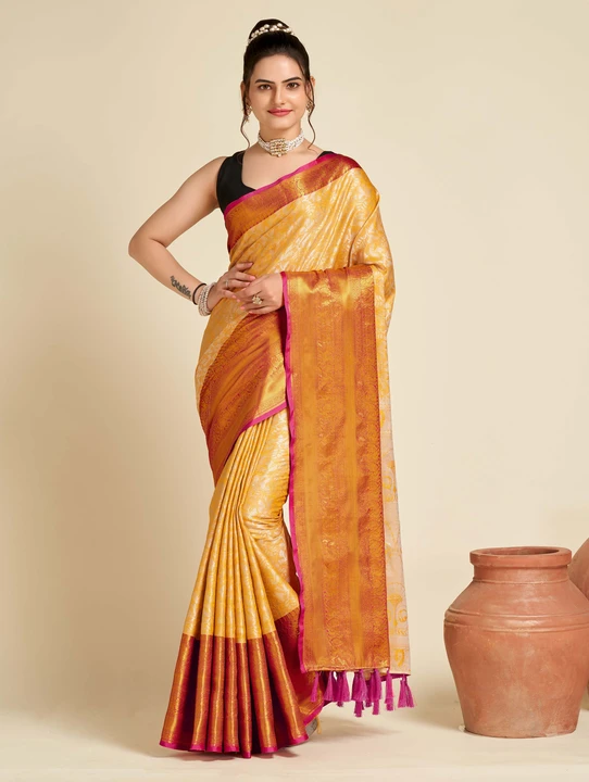 Yellow & Orange color tissue silk saree with woven design uploaded by business on 12/16/2023
