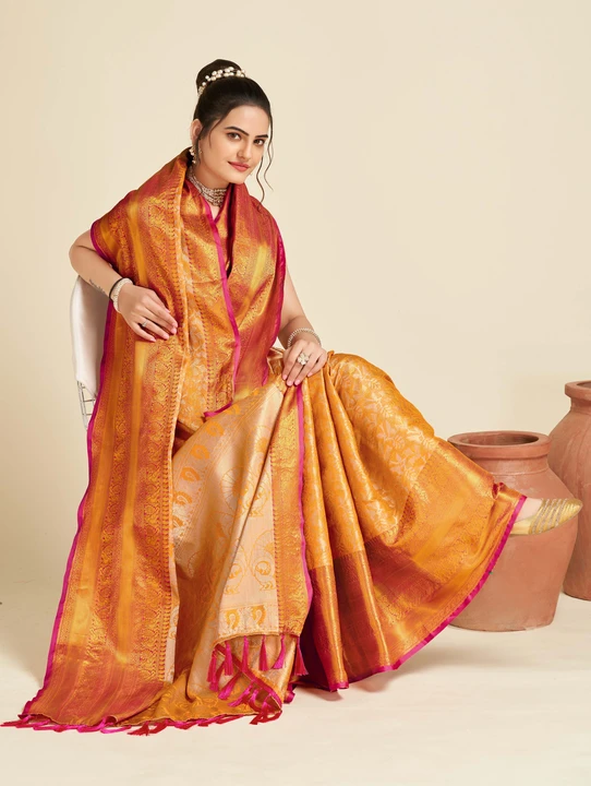 Yellow & Orange color tissue silk saree with woven design uploaded by VAIDEHI SUPER STORE VAIDEHI SUPER STORE on 12/16/2023
