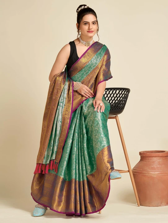 Green color tissue silk saree with woven design uploaded by VAIDEHI SUPER STORE VAIDEHI SUPER STORE on 12/16/2023