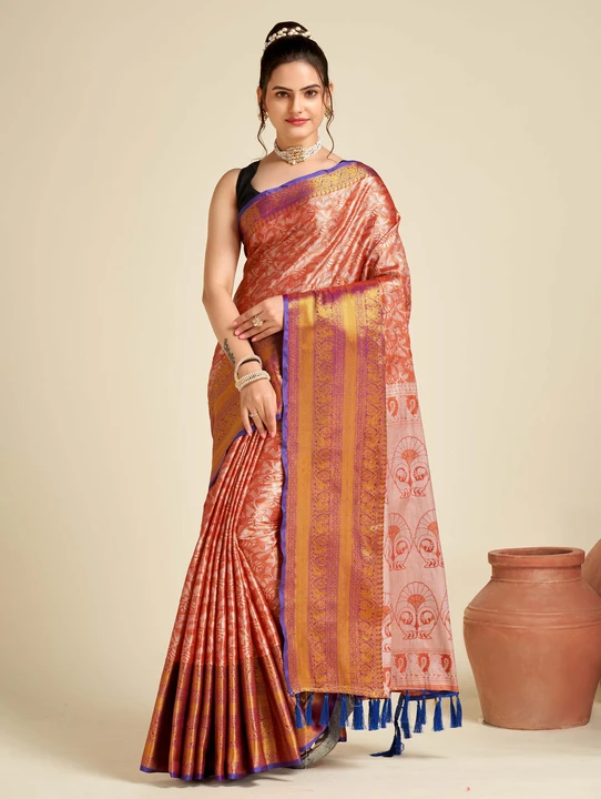 Orange color tissue silk saree with woven design uploaded by business on 12/16/2023