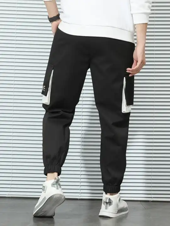 New arrival 💫💫🎉🎉
Premium quality Ns laycra  black color in White cargo matching pocket Box cargo uploaded by Crown sports  on 12/24/2023