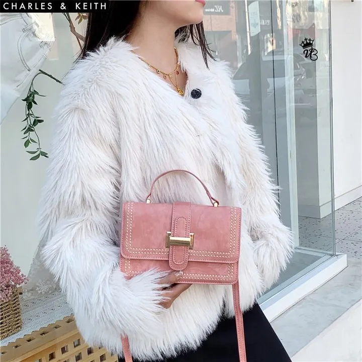 Post image BRAND - *CHARLES &amp; KEITH*
*_Imported Good Quality Crossbody Bags_*

STOCK - Available in 2 Colours

*CHECK LIVE VIDEO - 8x 5.5 inch*
Bw contact number.7003038096