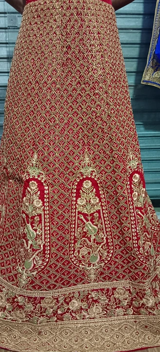 Red lahnga havy handwark moti uploaded by Shivam fashion on 12/31/2023