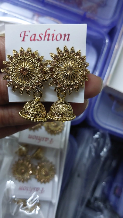 Golden color stone jhumki uploaded by business on 1/7/2024