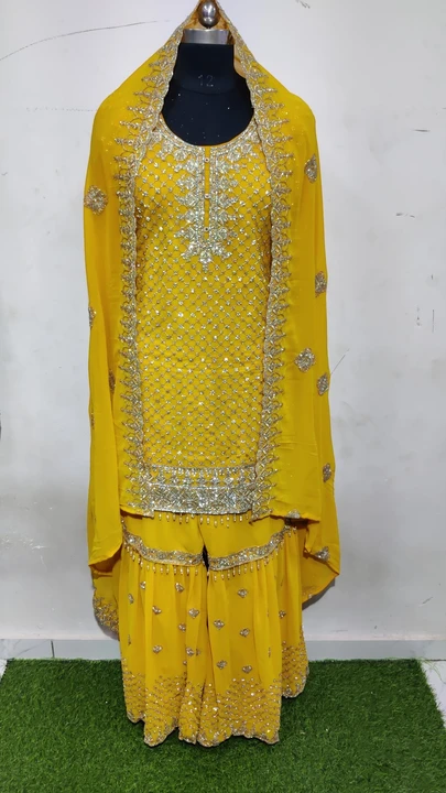 BLOOMING HEAVY WORK TOP WITH FULL ZARKAN WITH GHARARA  uploaded by Humera fashion on 1/10/2024