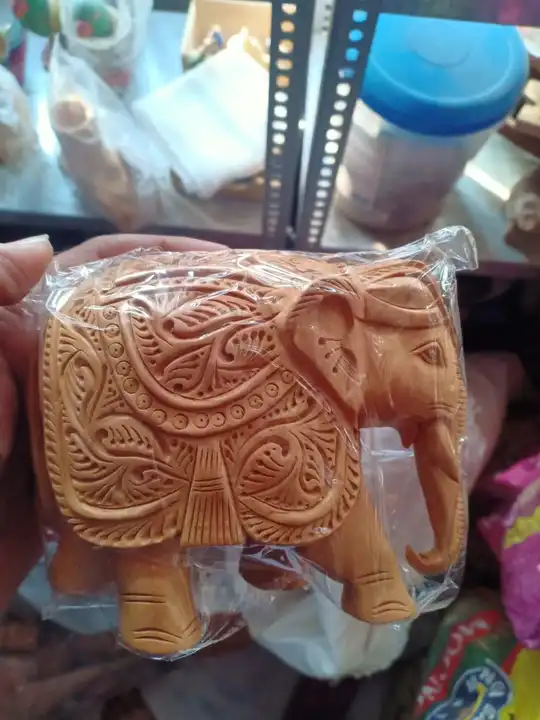 Wooden hand carving elephant  uploaded by business on 1/17/2024