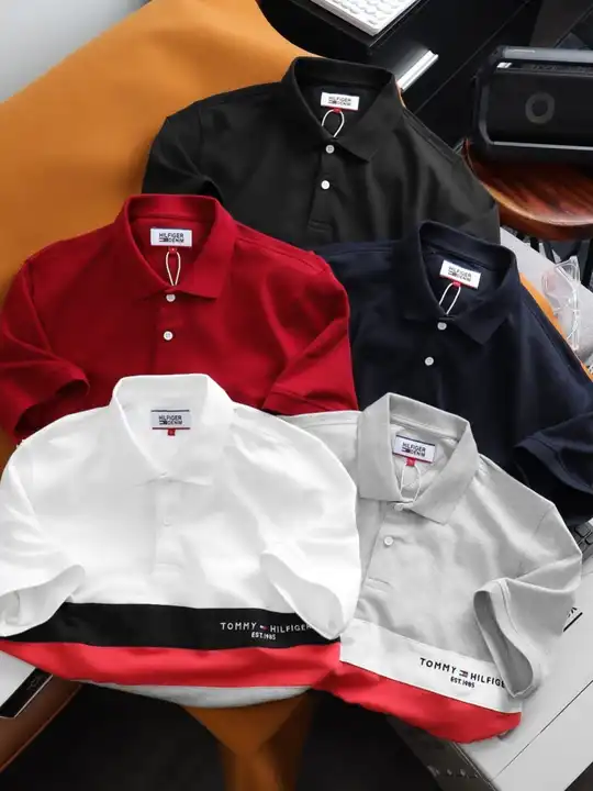 Post image *TOMMY HILFIGER PREMIUM QUALITY POLO T-SHIRTS*

Style - premium quality men's Polo half sleeves cut &amp; sew and embroidery tshirt

*Fabric - 100% compact yarn combed cotton pique fabrics*

*Gsm - 240 gsm bio wash fabrics*

*Colors - 5*

*Size- M,L,XL,XXL*

Ratio- 2 2 2 2

*Price- 331 rs*
            
Moq- 44 (40+4) pcs

 All goods are in single pcs hm cover packed and 8 pcs master cover packed

*Original branded accessories used*

*High quality embroidery* *and cut &amp; sew work*

Best quality for retails showroom 👌

Goods ready for delivery