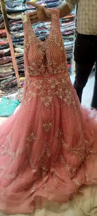 Post image I want 50+ pieces of  cropto ready made 
Gown indowestern (net me) at a total order value of 50000. Please send me price if you have this available.