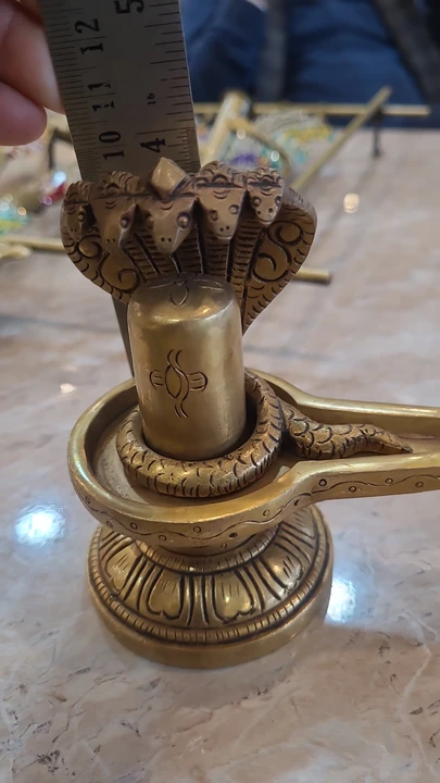 Pure brass shivling uploaded by business on 2/27/2024