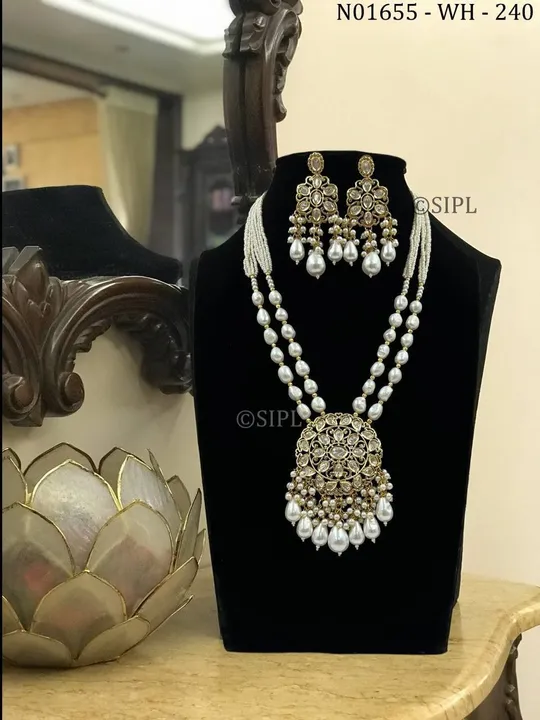 Polki NECKLACE set along with fresh water pearl and cultivated pearls uploaded by business on 3/18/2024