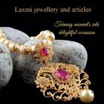 Business logo of Laxmi jewelry and articles and elec