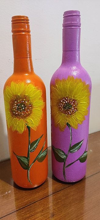 Beautiful sunflower painted glass bottle ( set of 2) orange and lavender colour. Weight- 500gm each. uploaded by Flawless handicrafts on 7/20/2020