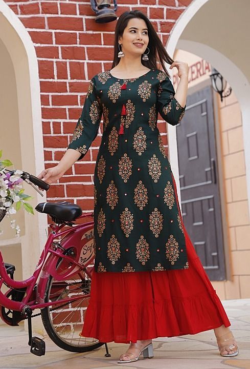 Latest Kurti with sharara
Mirror work 
Gold print 
Kurti length 44 inches sharara length 37 inches 
 uploaded by business on 7/20/2020