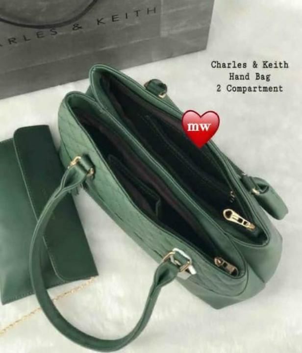 CHARLES & KEITH😍
Set of 2pcs combo🥰

Handbag Spacious with Double chain & Shoulder uploaded by Am collection on 3/31/2021