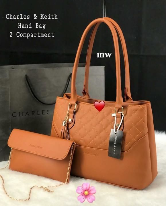 CHARLES & KEITH😍
Set of 2pcs combo🥰

Handbag Spacious with Double chain & Shoulder uploaded by business on 3/31/2021