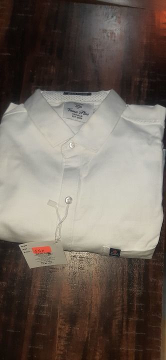 White shirt uploaded by business on 4/2/2021