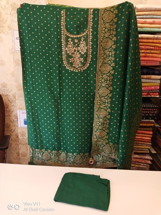 Post image Bottle green clour banarasi dola silk suit with delicate ethnic handwork on neckline, banarasi silk dupatta and unstich bottom.


http://www.facebook.com/elladressmaterials/