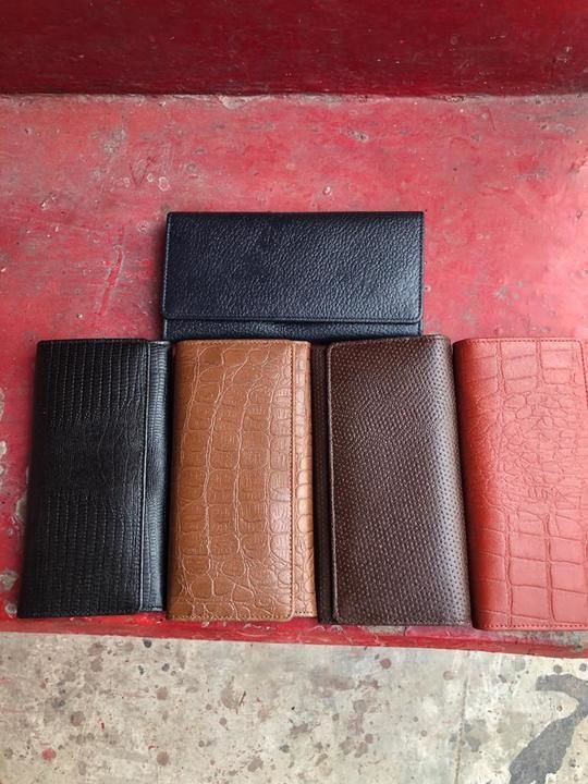 Post image Leather clutches and belts available for wholesale only
