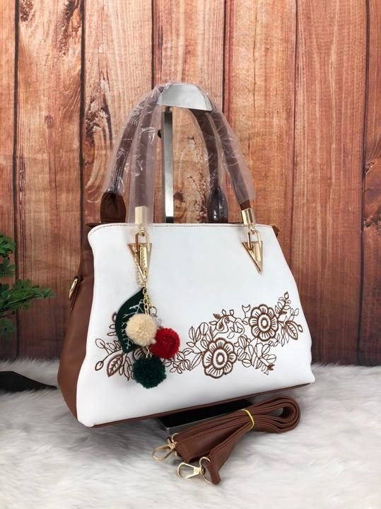 Post image *FANCY Handbag For Women *
✅✅✅✅✅✅
Size-12x4.5x8.5 inch LXBXH
Three COMPARTMENT with one chain ❤️
one pocket at inside 🥀
One pocket at backside 🌺
Embroidery design at front 
Long belt with removable hook 🪝 
❤️❤️❤️❤️❤️❤️❤️
Wonderful Quality 
✅✅✅✅✅✅✅
Price : *730 + Shipping*