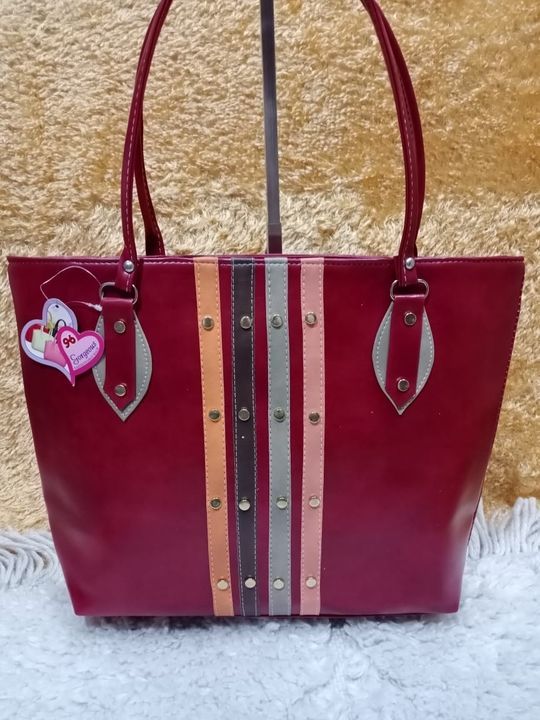 Post image This Stylish Handbags and Purses from Sakhi Creations is a must have addition to your outfit. For a chic work outfit, style this beautiful different colours piece with slick black jeans, a trendy top and a platform heel.