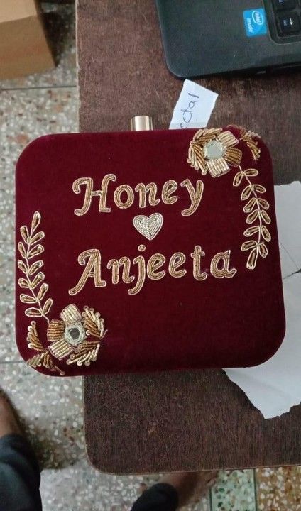 A beautiful embroidery purse with name embroidery  uploaded by business on 4/8/2021