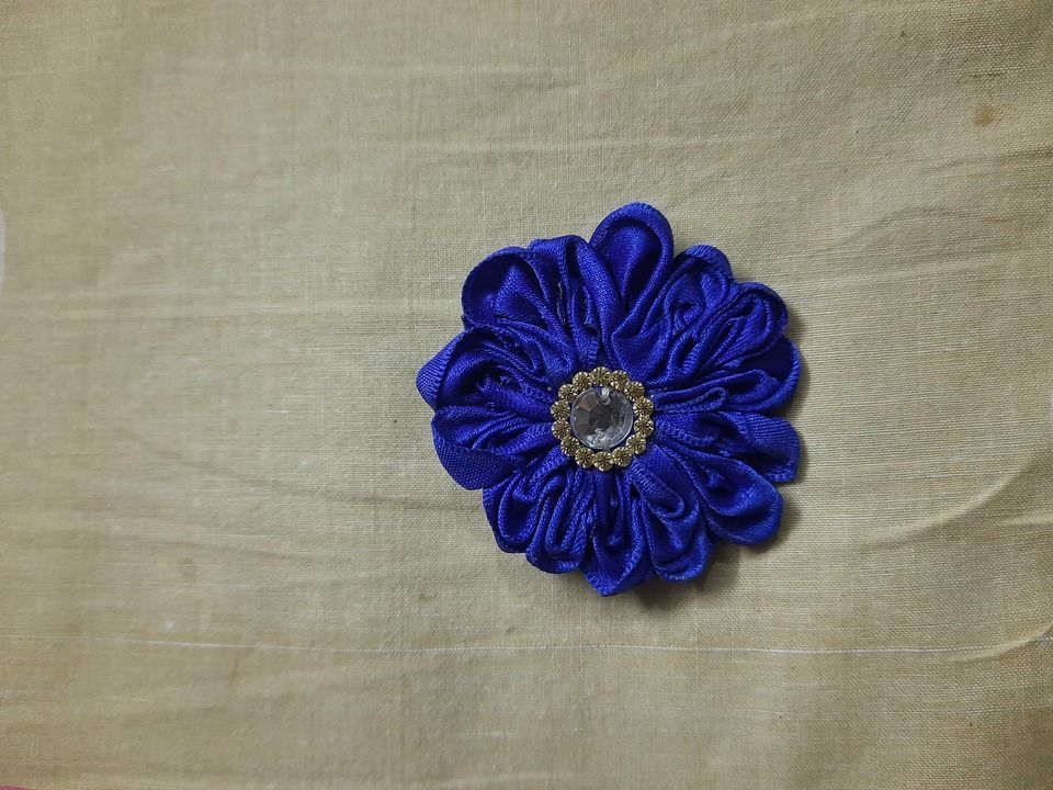 Ribbon flower brooch uploaded by Dharala Products  on 4/11/2021