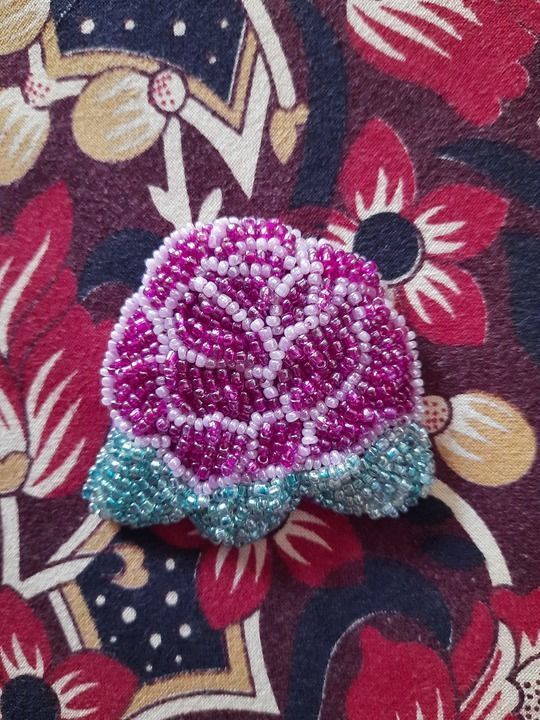 Beaded rose brooch uploaded by Dharala Products  on 4/11/2021