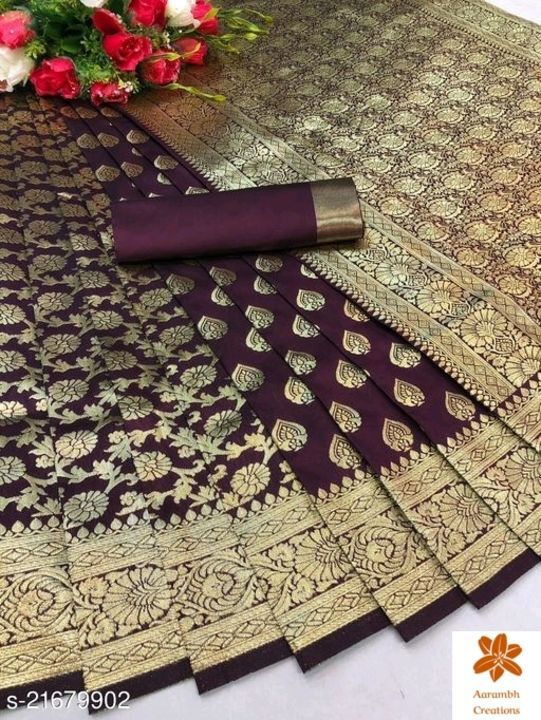 Post image Saree Fabric: Banarasi Silk
Blouse: Running Blouse
Blouse Fabric: Banarasi Silk
Pattern: Solid
Blouse Pattern: Same as Saree
Sizes: 
Free Size (Saree Length Size: 5.5 m, Blouse Length Size: 0.8 m)