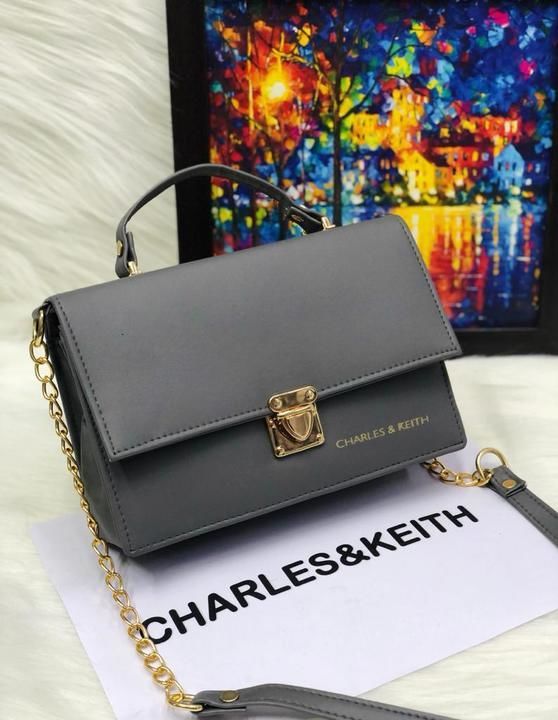 Post image Charles &amp; Keith lock sling
Size 9/6
Good quality
Rs 270+80 shipping