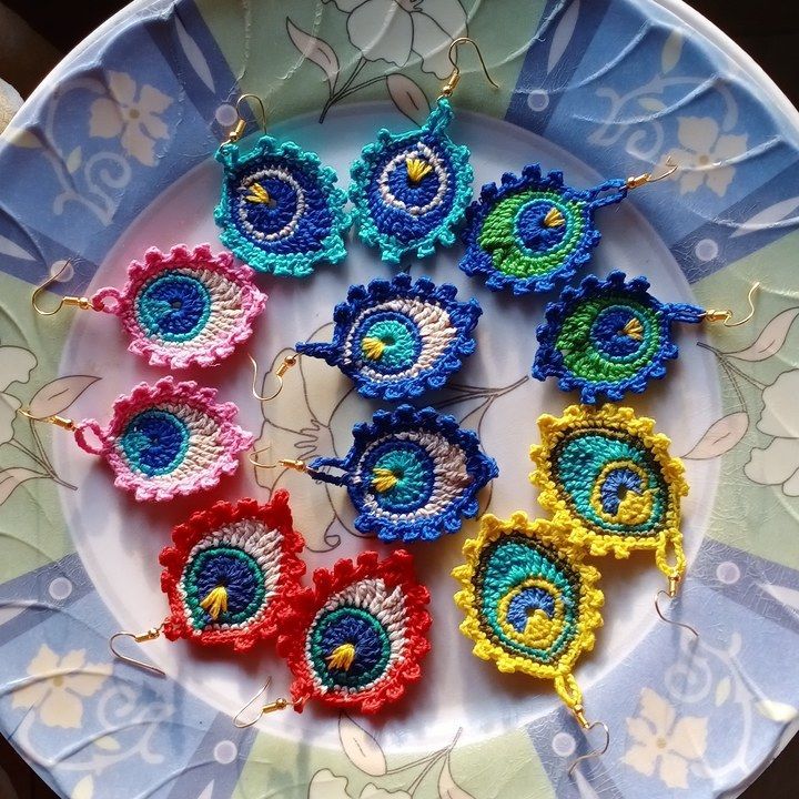 Crochet peacock feather earrings  uploaded by Hoichoi creation on 4/24/2021
