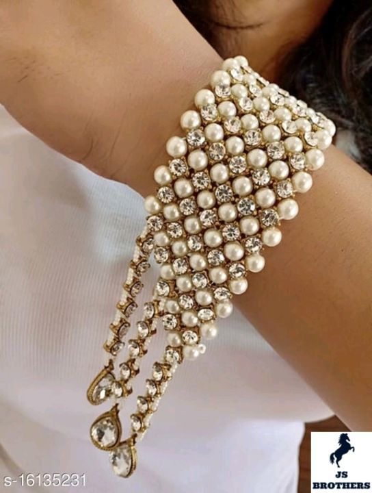 Allure Chunky Bracelet & Bangles

Base Metal: Alloy
Plating: Gold Plated
Stone Type: Artificial Ston uploaded by business on 4/24/2021
