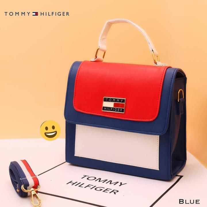 *TOMMY HILFIGER*

Shoulder bag / Handbag / Sling bag

☑️ Best Quality
☑️ Long Belt
☑️ 2 pockets
☑️ B uploaded by Divya creations  on 4/26/2021