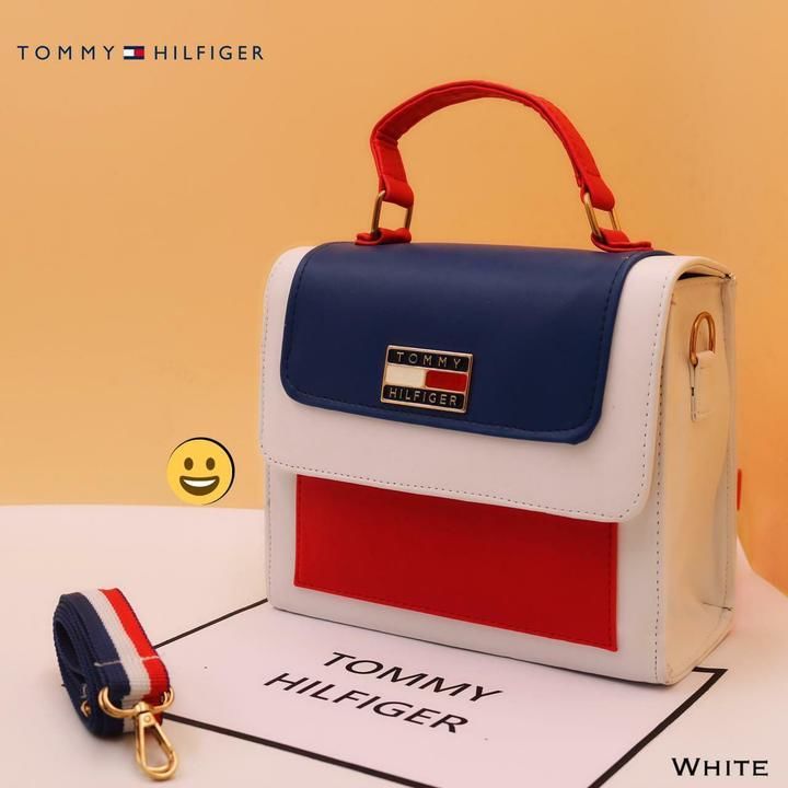*TOMMY HILFIGER*

Shoulder bag / Handbag / Sling bag

☑️ Best Quality
☑️ Long Belt
☑️ 2 pockets
☑️ B uploaded by Divya creations  on 4/26/2021