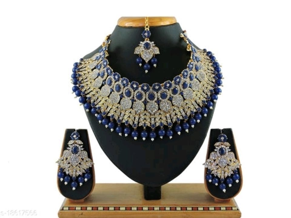 Post image Shimmering Chic Jewellery Sets

Base Metal: Alloy
Plating: Gold Plated
Stone Type: Artificial Stones &amp; Beads
Sizing: Adjustable
Type: Necklace Earrings Maangtika