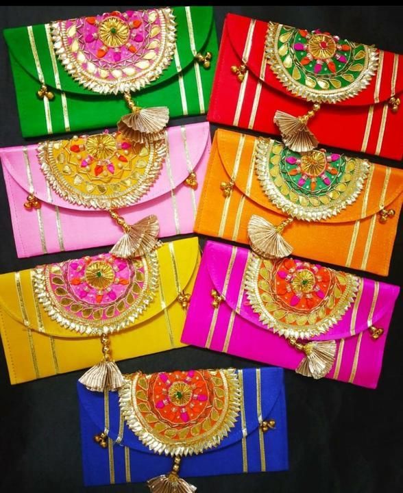 Multicolor Handmade Rajasthani Gotta Work Hand Clutch uploaded by Neetya Fashions on 4/28/2021