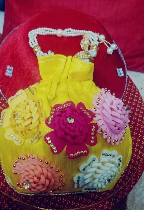 Beautiful Handmade Flower Potli Bag uploaded by business on 4/28/2021