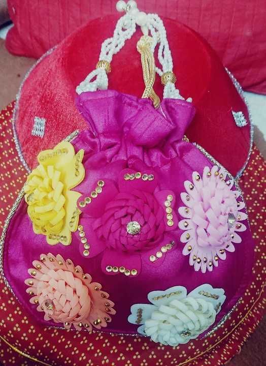 Beautiful Handmade Flower Potli Bag uploaded by Neetya Fashions on 4/28/2021
