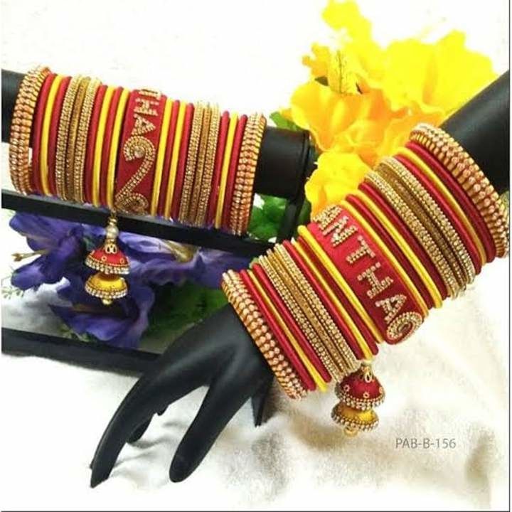 Post image Beautiful Silkthread Bridal Bangles With Names...
Colour &amp; Design can be customized..
Bulk orders also taken..
Dm for queries