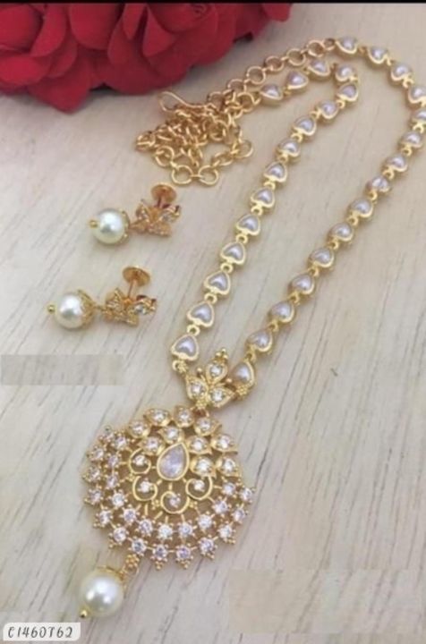 Trendy pearl work temple jewellery set uploaded by business on 4/30/2021